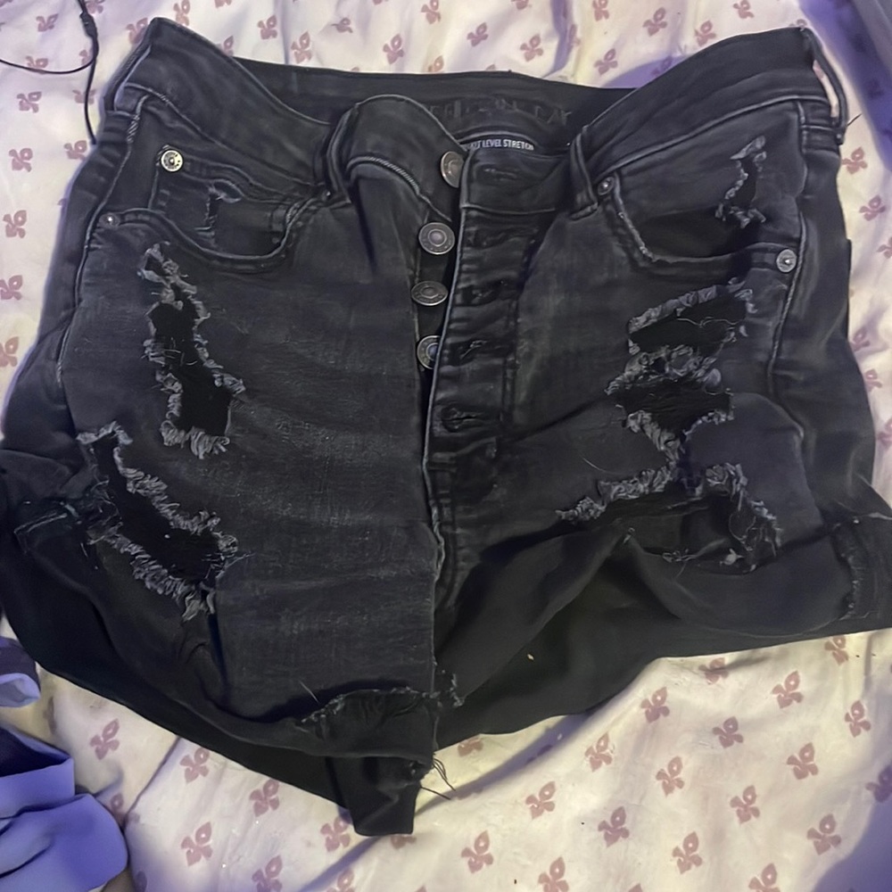black ripped jeans